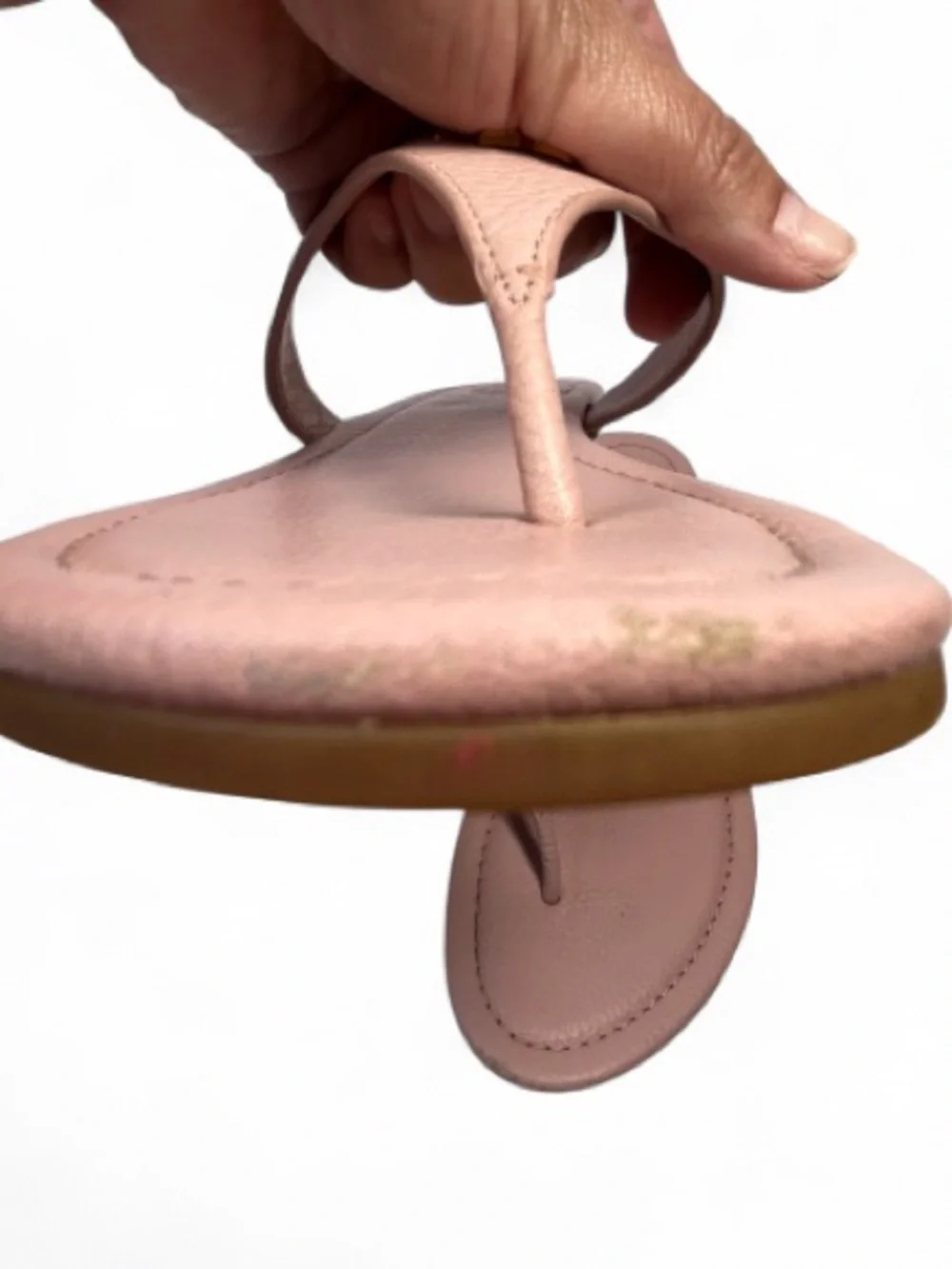 the Tory Burch Jolie Flat Thong Sandals in Sea Shell Pink tumbled leather. 6.5